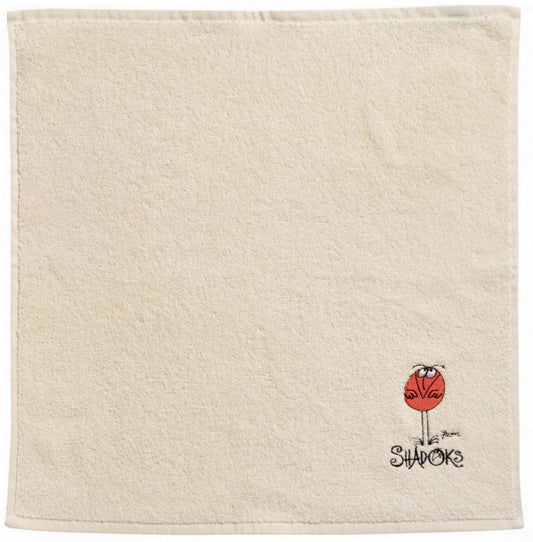 asciugamano quadrato shadoks avorio, colore avorio, taglia 50 x 50. asciugamano piegato su sfondo neutro per una visione pulita del prodotto 1673