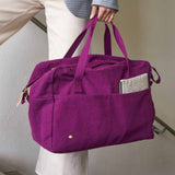 borsa da viaggio iona pioggia viola, colore pioggia viola, taglia 30 x 42 x 20. realizzata in 100% cotone bio, pensata per viaggiare con stile e sostenibilità