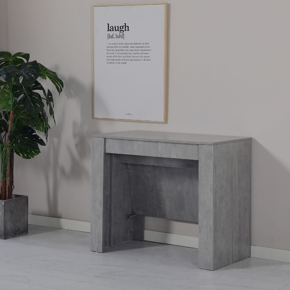 consolle allungabile ofelia colore grigio cemento, consolle aperta mostrata in ambiente sala da pranzo