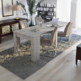 consolle allungabile luka con 4 allunghe colore cemento, dettaglio della struttura e finitura in legno naturale