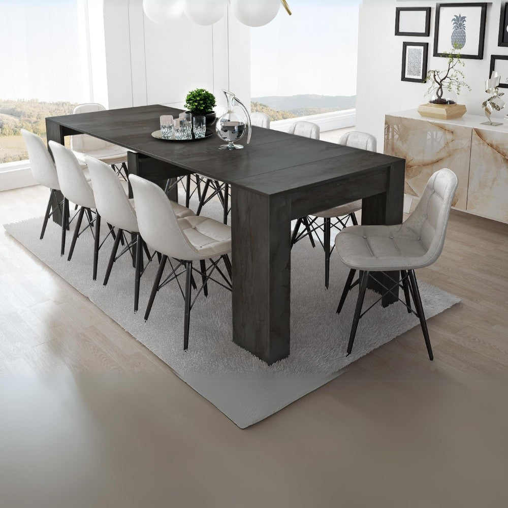 consolle allungabile luka con 4 allunghe colore ossido, dettaglio della struttura e finitura in legno naturale