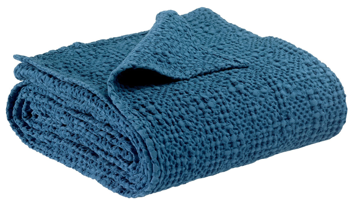 plaid tana touareg, colore touareg, taglia 140 x 200. vista frontale della coperta piegata su sfondo bianco