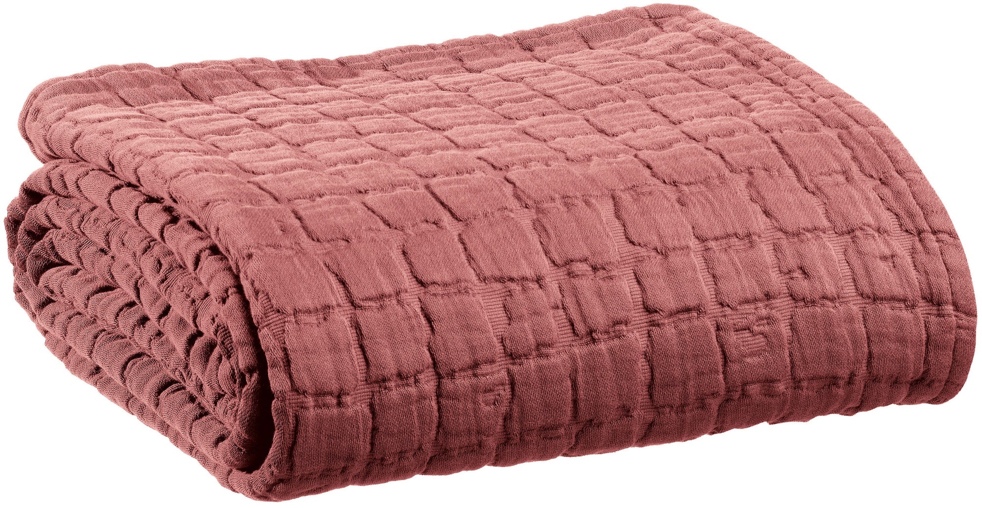 coperta swami terra di siena, colore terra di siena, taglia 180 x 260. vista frontale della coperta piegata su sfondo bianco