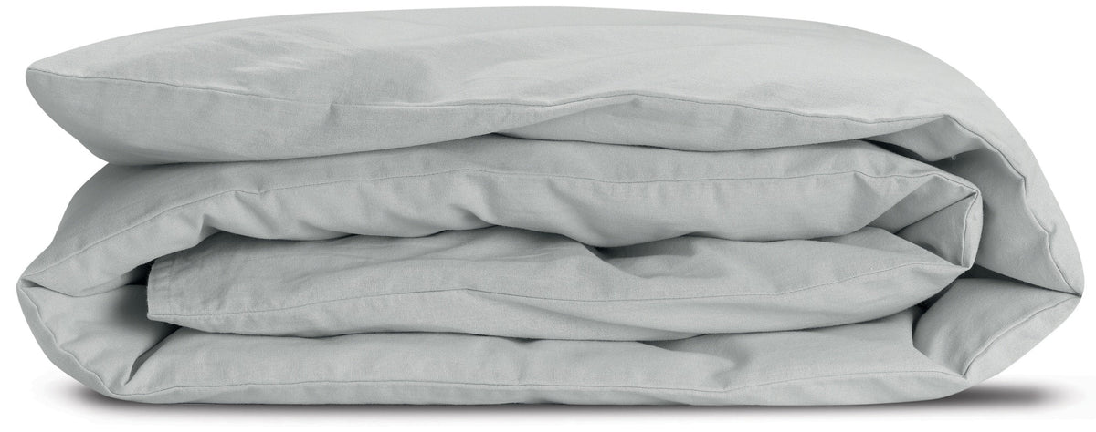 copri piumino calita perla, colore perla, taglia 85 x 200. copripiumino piegato su sfondo neutro per una visione dettagliata