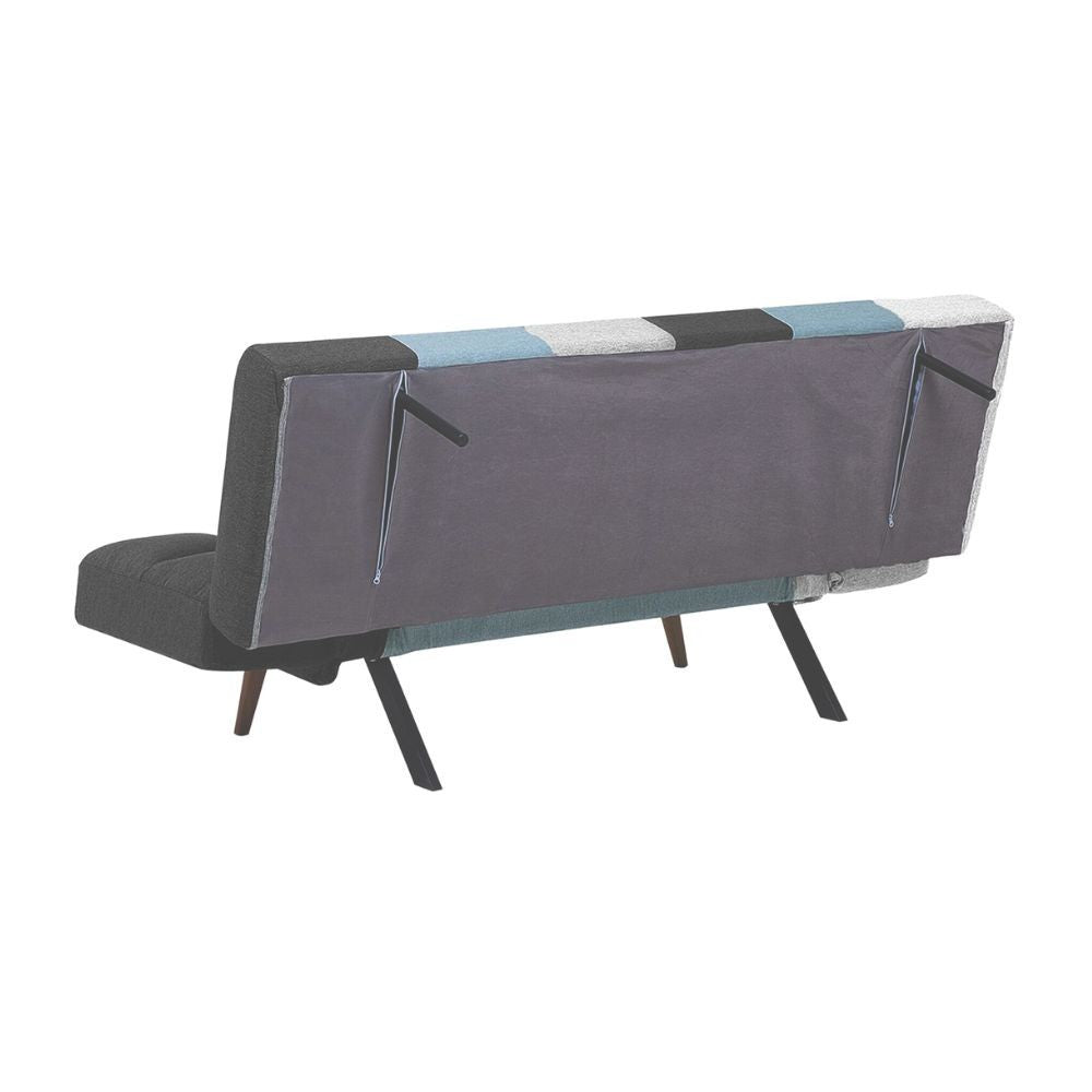 divano letto dube con braccioli pieghevoli in tessuto patchwork, vista laterale per mostrare profondità e comfort