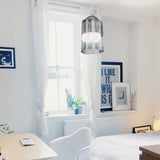 lampada da soffitto optical mdl3871 con paralume triangolo in plastica fumè, ambientazione moderna con punto luce centrale sopra il tavolo