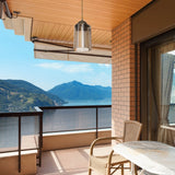 lampada da soffitto optical mdl3749 con paralume triangolo in plastica ambrato, ambientazione moderna con punto luce centrale sopra il tavolo