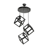 lampada a sospensione  agatha mdl3790 3 cubi nero, ambientazione moderna con punto luce centrale sopra il tavolo