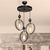 lampada a sospensione esin con tre portalampade a cerchio mdl4423, ambientazione moderna con punto luce centrale sopra il tavolo