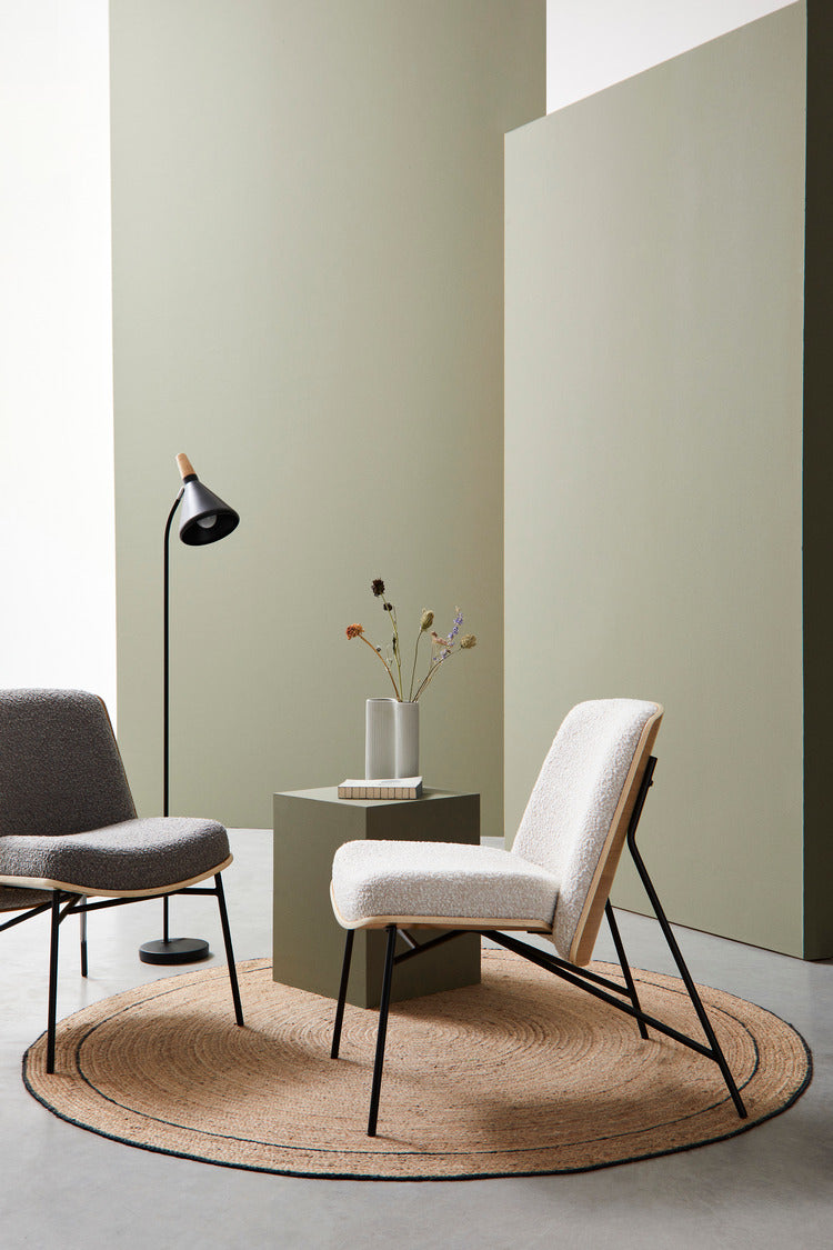 poltrona emerson in tessuto effetto bouclé avorio e gambe in acciaio nero, struttura in legno naturale, design ergonomico...