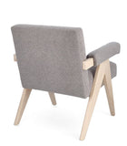 poltrona faiza in tessuto effetto bouclé tortora e gambe in legno rubberwood, perfetta per aggiungere comfort ed eleganza...