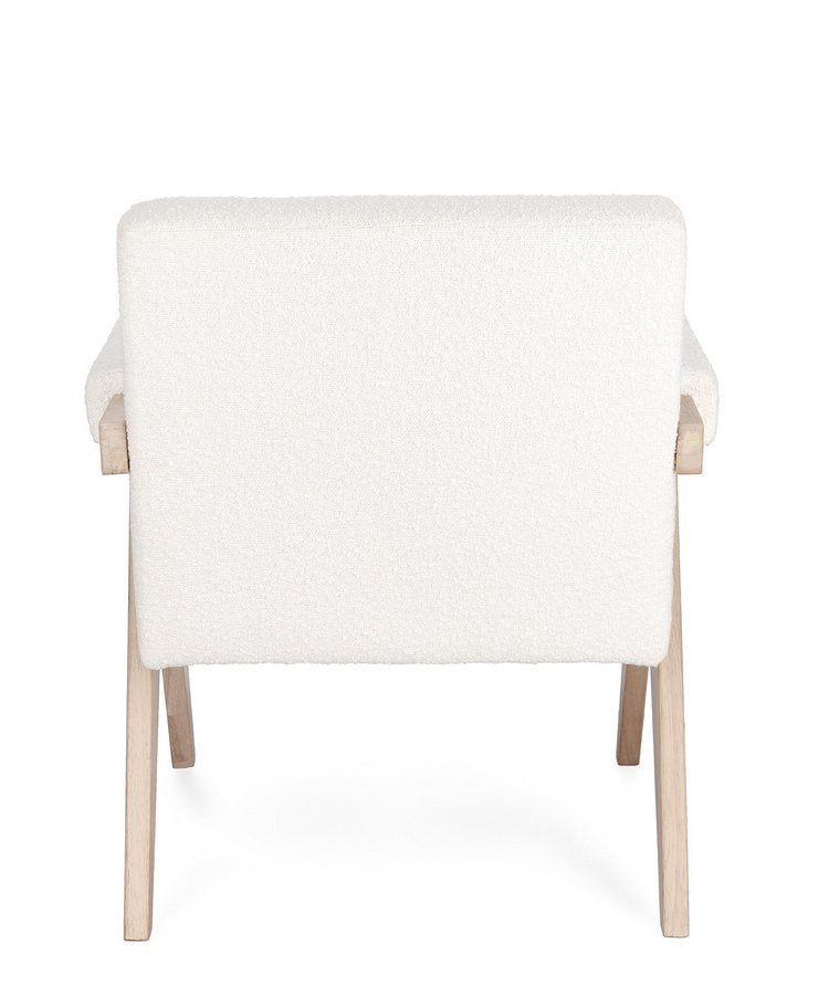 poltrona faiza in tessuto effetto bouclé avorio e gambe in legno rubberwood, perfetta per aggiungere comfort ed eleganza...