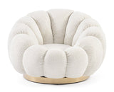 poltrona girevole florel in tessuto effetto bouclé naturale, vista ambientata in soggiorno o angolo lettura