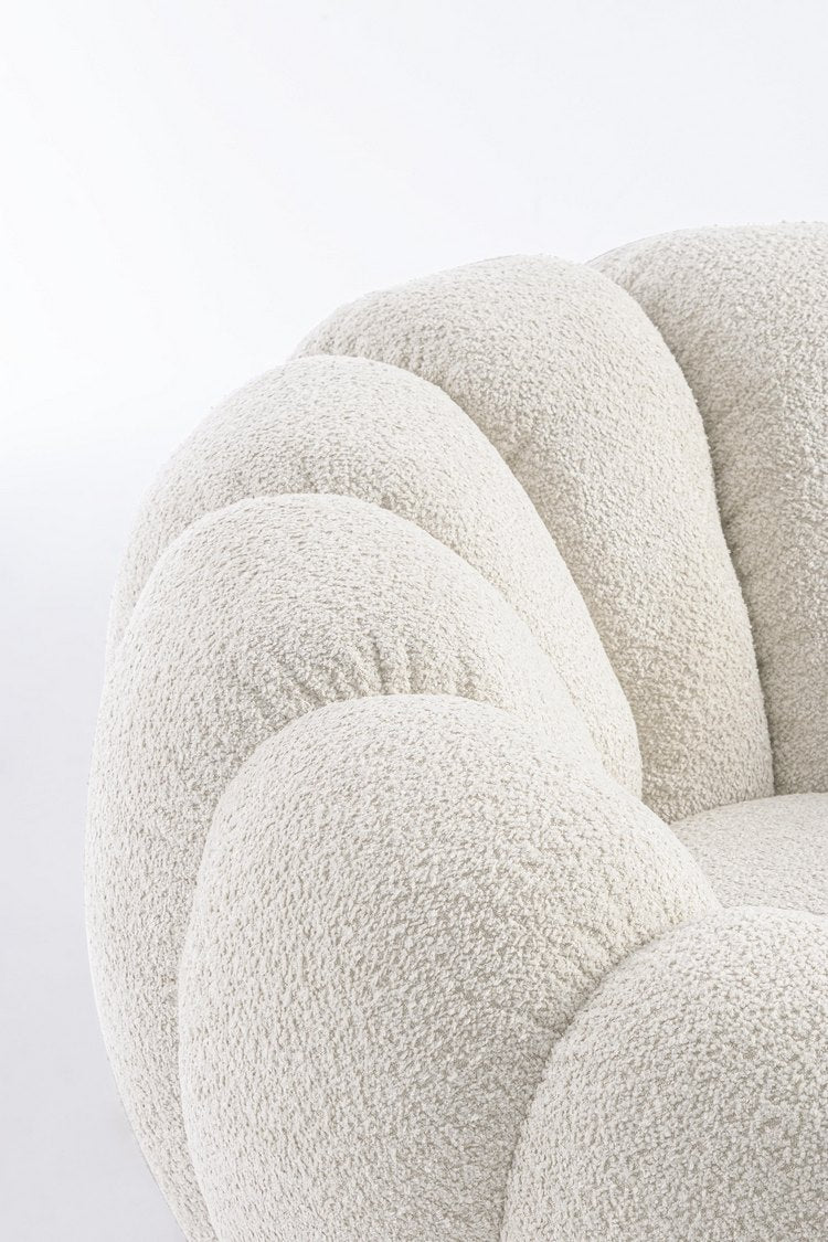poltrona girevole florel in tessuto effetto bouclé naturale, ideale per creare un angolo relax in casa