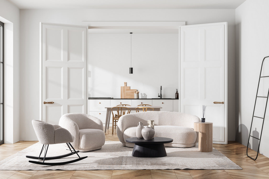 poltrona tecla in tessuto effetto bouclé naturale, disponibile in diverse colorazioni per adattarsi a ogni ambiente