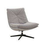 poltrona girevole brikell in tessuto grigio e base in metallo nero, vista ambientata in soggiorno o angolo lettura