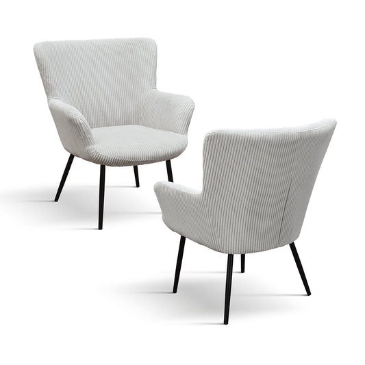 poltrona megeve in tessuto effetto velluto grigio chiaro e gambe in metallo, vista ambientata in soggiorno o angolo lettura