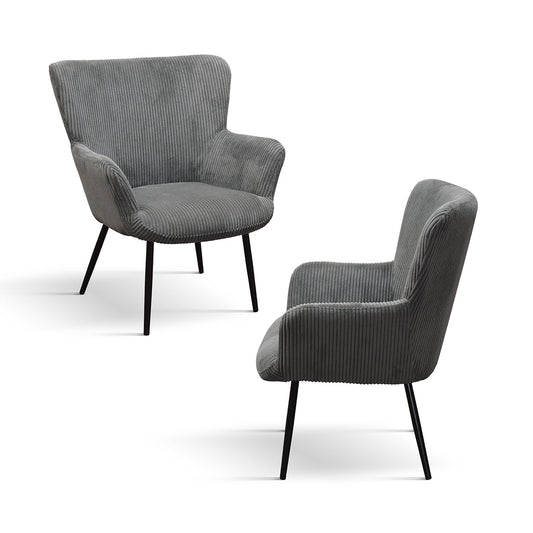 poltrona megeve in tessuto effetto velluto grigio scuro e gambe in metallo, vista ambientata in soggiorno o angolo lettura