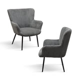 poltrona megeve in tessuto effetto velluto grigio scuro e gambe in metallo, vista ambientata in soggiorno o angolo lettura