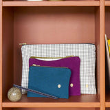 pochette iona uragano, colore uragano, taglia 11 x 14 x 1. dettaglio del prodotto da bagno