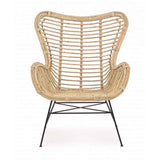 poltrona casilda in rattan, vista ambientata in terrazzo, giardino o veranda