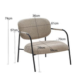 poltrona nat con struttura in metallo nero e seduta in tessuto teddy grigio scuro, ideale per creare un angolo relax in casa