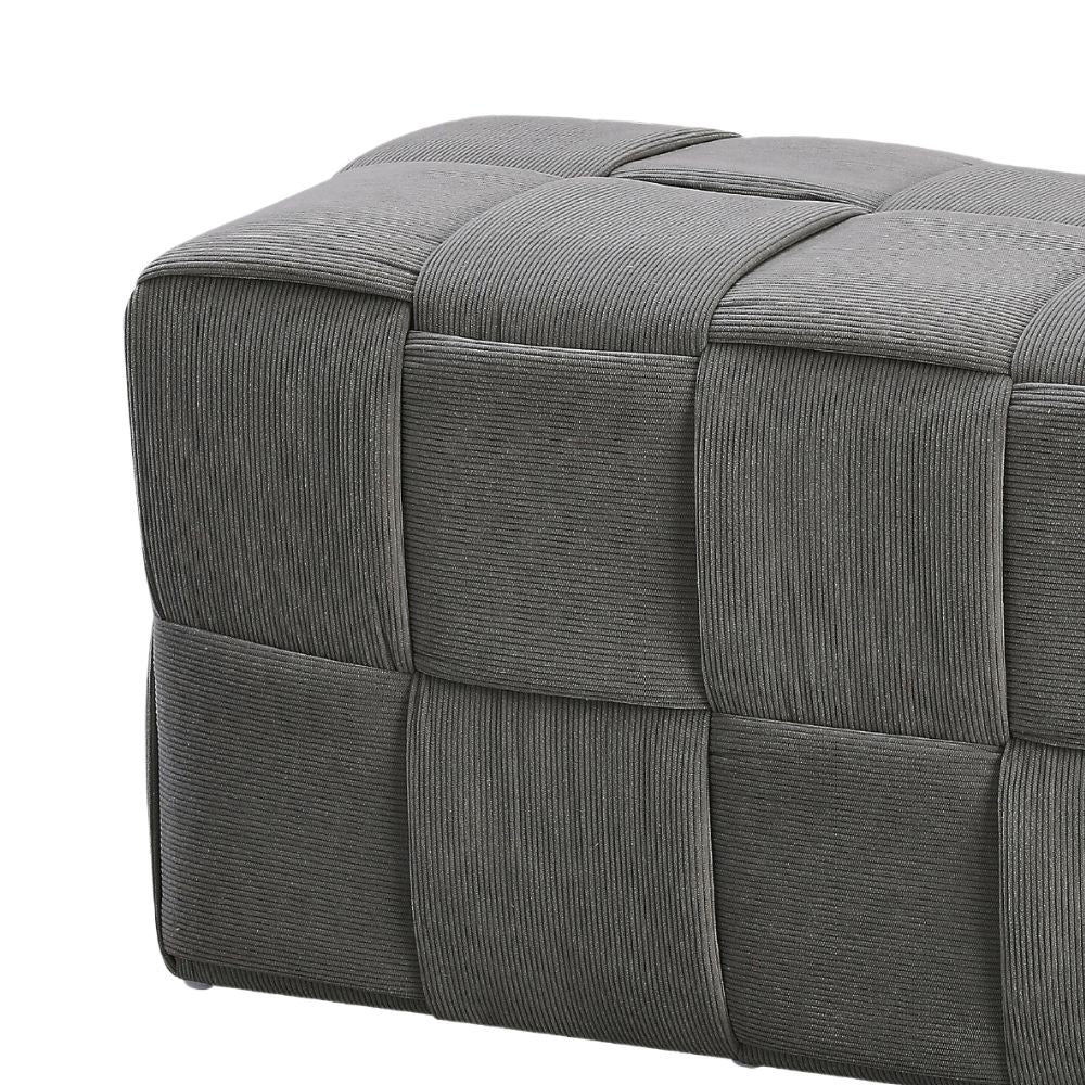 pouf den rettangolare effetto intrecciato colore grigio, dettaglio delle cuciture e materiali di rivestimento