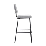 sgabello juno in tessuto colore grigio chiaro e struttura in metallo nero, idea pratica per ambienti domestici