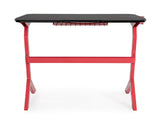 scrivania gaming in legno e pvc nero con base acciaio rosso, 118 x 65 cm, ambientazione d’arredo con il prodotto protagonista