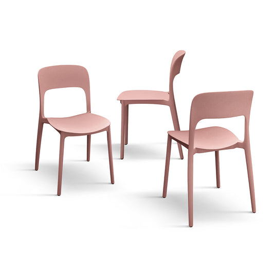 set di 4 sedie fuerteventura in polipropilene rosa, dettaglio della finitura in metallo, plastica o legno trattato