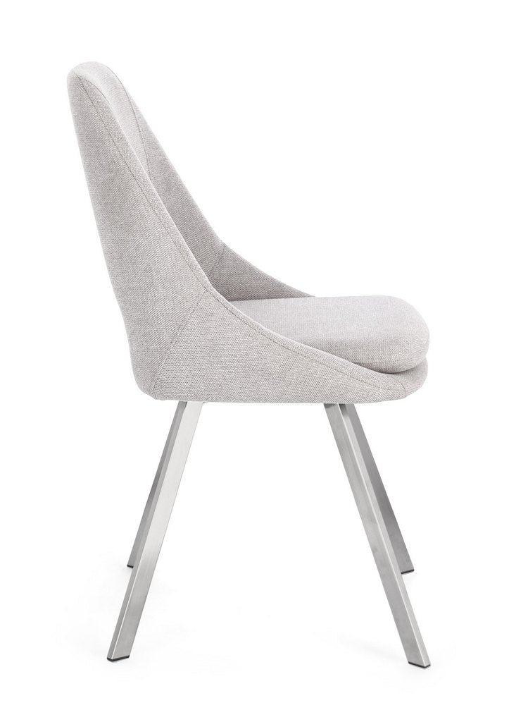 set di 2 sedie kashar in tessuto grigio chiaro e gambe acciaio, vista ambientata attorno a un tavolo da pranzo