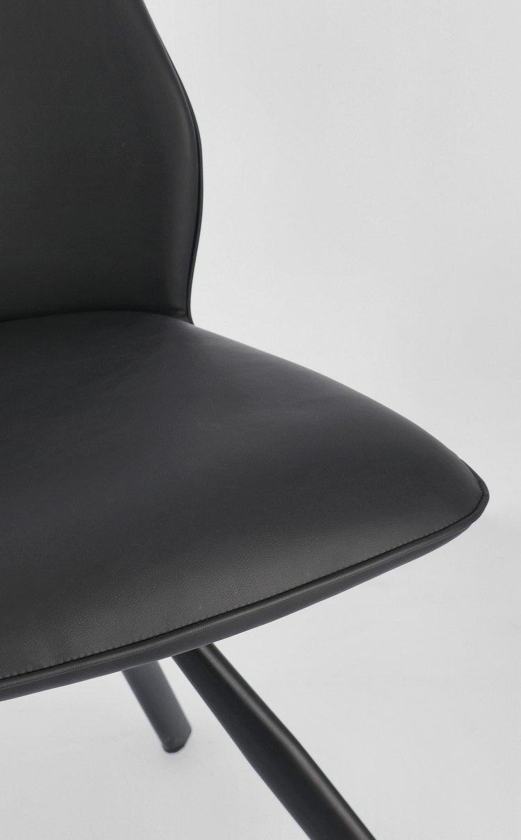 set di 4 sedie maxwell similpelle nero e gambe acciaio nero, facile da abbinare a qualsiasi stile d’arredo