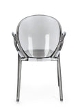 set di 4 sedie camilla in policarbonato trasparente fumé, impilabili, vista ambientata in soggiorno o sala da pranzo