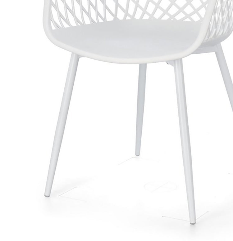 set di 4 sedie optik in polipropilene e acciaio bianco, vista ambientata in soggiorno o sala da pranzo