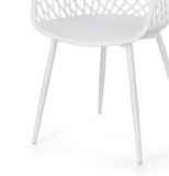 set di 4 sedie optik in polipropilene e acciaio bianco, vista ambientata in soggiorno o sala da pranzo