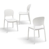 set di 4 sedie alicante in polipropilene bianco, ambientazione su terrazza, veranda o prato