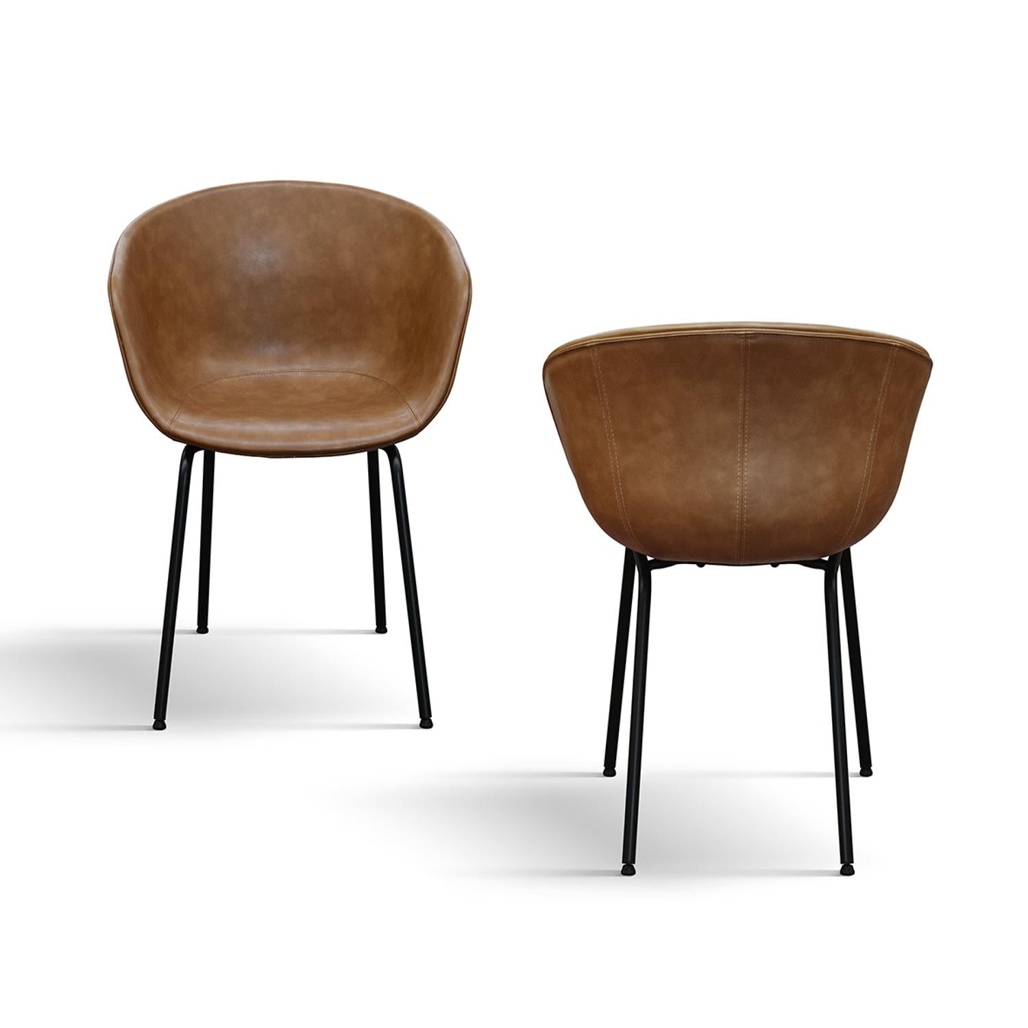 set di 4 sedie copenaghen rivestite in pelle cammello e gambe in metallo nero, dettaglio della struttura in legno, metallo o...