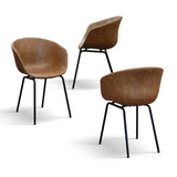 set di 4 sedie copenaghen rivestite in pelle cammello e gambe in metallo nero, vista ambientata attorno a un tavolo da pranzo