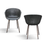 set di 4 sedie copenaghen rivestite in pelle antracite e gambe in metallo nero, dettaglio della struttura in legno, metallo...