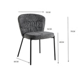 sedia imbottita cami in tessuto teddy azzurro polvere, vista ambientata in soggiorno o sala da pranzo