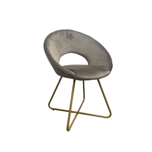 poltroncina etere in velluto grigio con gambe in metallo dorato, dettaglio dell’imbottitura morbida e confortevole