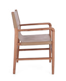 poltroncina caroline in legno di teak e vera pelle tortora, vista ambientata in soggiorno o sala da pranzo