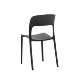 set di 4 sedie south beach in polipropilene nero, ambientazione su terrazza, veranda o prato