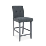 sgabello alex in legno colore grigio con seduta in tessuto grigio, vista ambientata accanto a bancone o isola