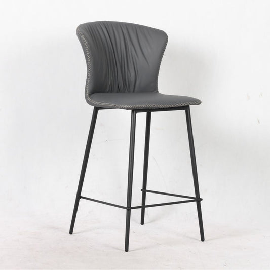 sgabello core colore antracite con gambe in metallo nero, dettaglio della seduta imbottita o in legno