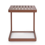 set di 2 tavolini rettangolari konnor in alluminio ruggine, vista ambientata su terrazza o veranda