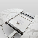 tavolo filicudi rotondo ø120 allungabile, in ceramica effetto marmo e base bianca metallo, ideale per ospitare pranzi o...