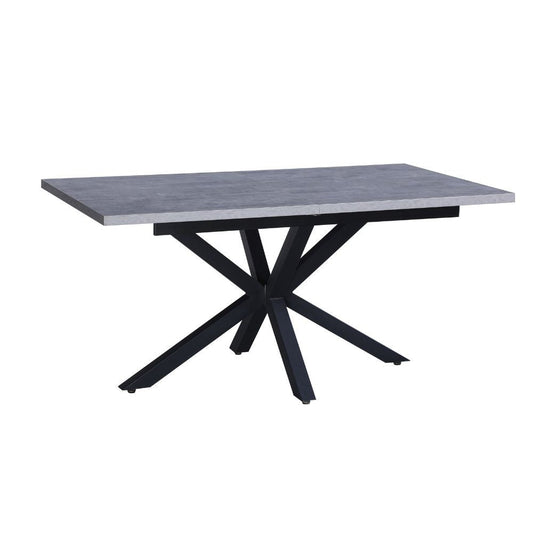 tavolo rettangolare allungabile rob con piano cemento e gambe in metallo nero, dettaglio della superficie allungata e gambe robuste