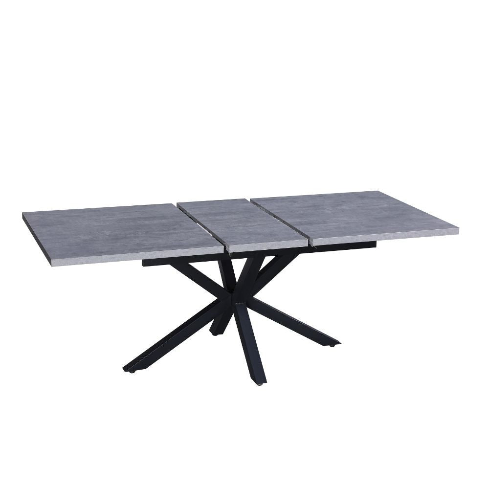 tavolo rettangolare allungabile rob con piano cemento e gambe in metallo nero, vista ambientata in spazi open space moderni