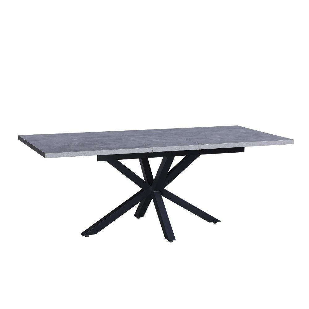 tavolo rettangolare allungabile rob con piano cemento e gambe in metallo nero, ideale per ospitare numerosi commensali